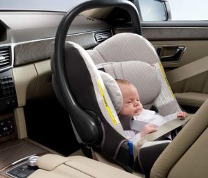 niño silla coche