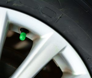 tapon verde rueda coche