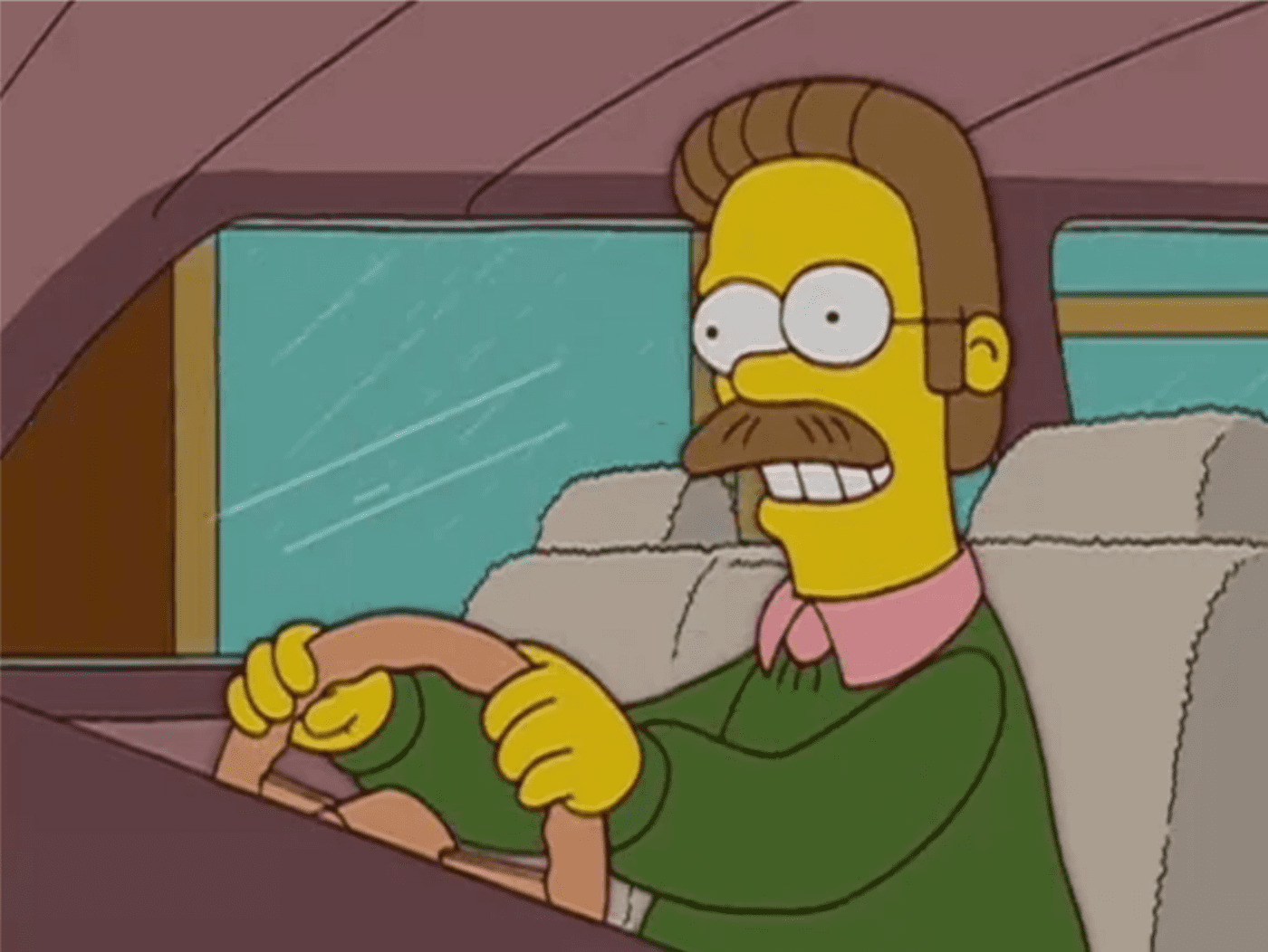 ned flanders conduce por la izquierda