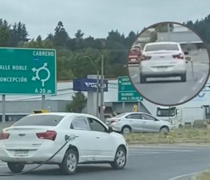 coche manguera repostar colgando