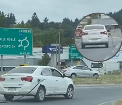 coche manguera repostar colgando