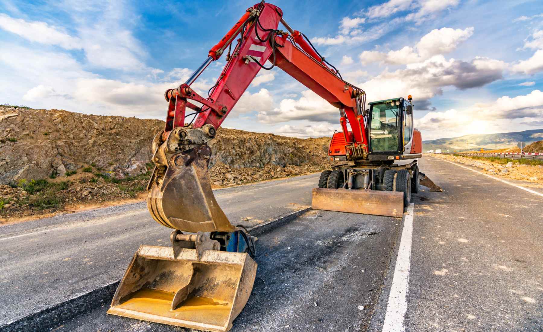 Reparación de carretera asfaltada.