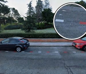 Aparcamiento Madrid líneas blancas y rojas